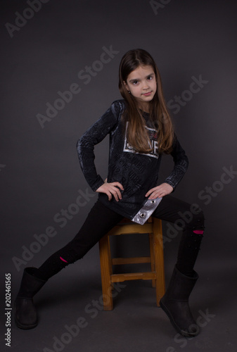 little girl posing inside