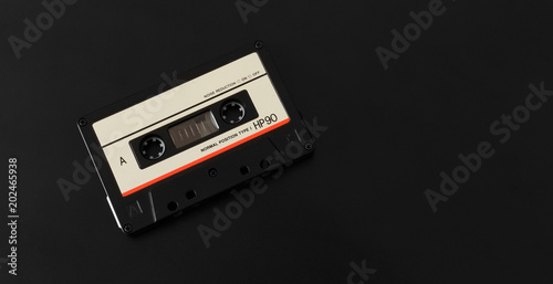 vintage cassette tape on black background