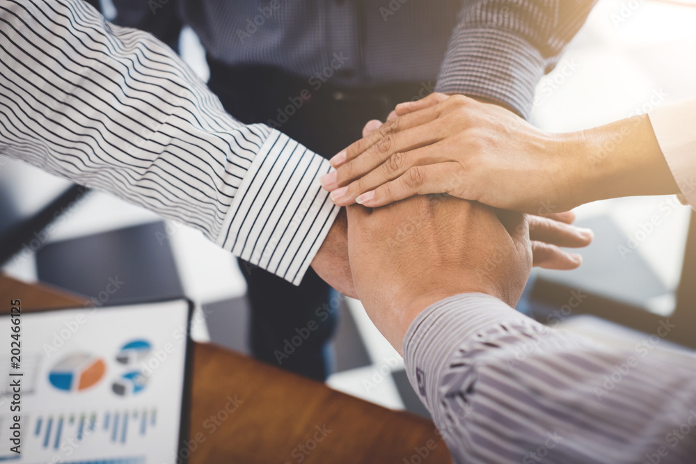 Business partnership meeting, Image of business people joining and putting hands together during their meeting, connection and collaboration concept, Teamwork process of partner and best relationship