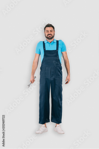 top view of plumber with spanner isolated on white background