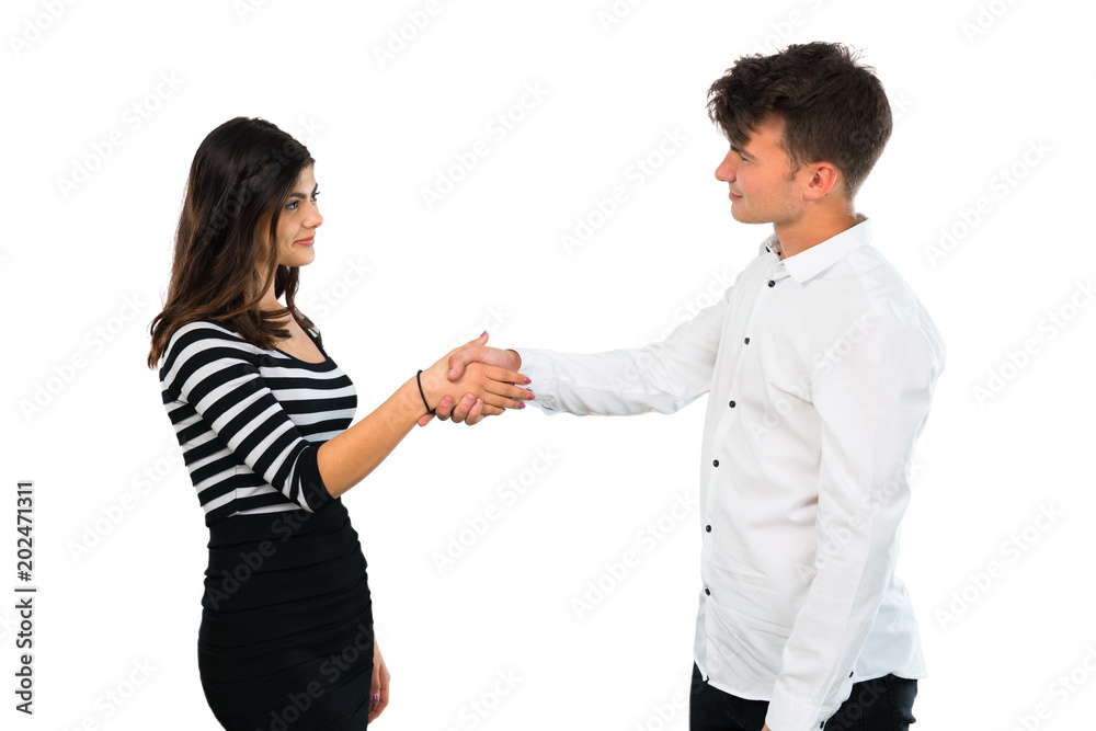 Young couple handshaking after good deal on isolated white background Young couple handshaking after good deal on isolated white background