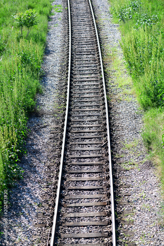 Railroad and green grass. Train rails 