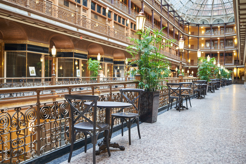 Chair and table for dining at the Old Arcade in Downtown Cleveland. Given National Historic Landmark status in 1975, the Arcade in downtown Cleveland is Victorian