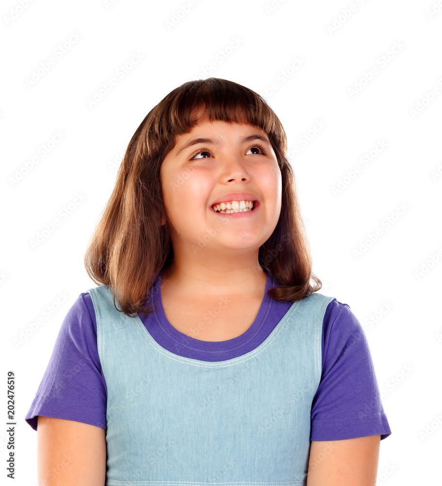 Pensive small girl imagining something Pensive small girl imagining something