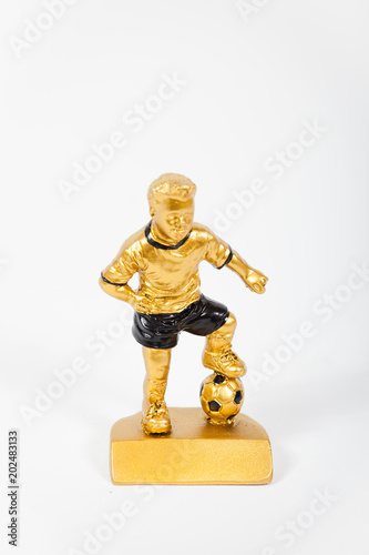 statuette a small football player