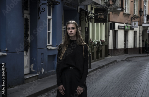 Hipster girl walking on the street, lifestyle.