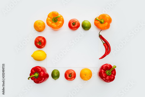top view of frame of vegetables and fruits isolated on white