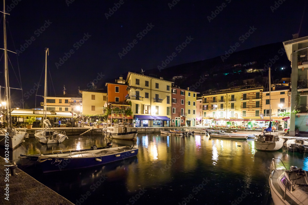 night view over of restaurant at Garda lake in Italy.