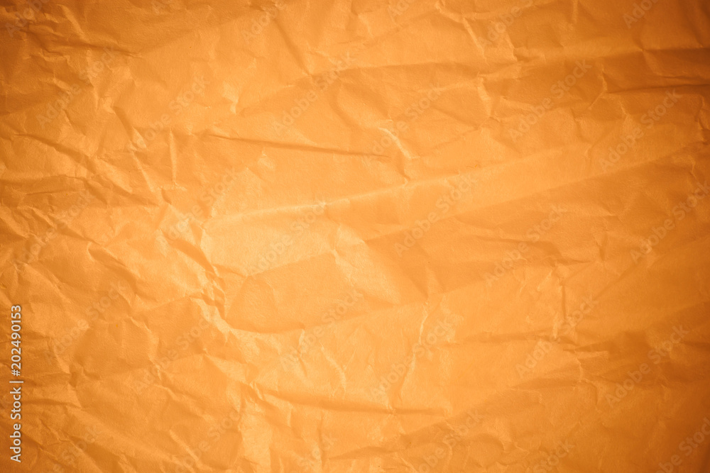 Fototapeta premium Brown crumpled paper background.