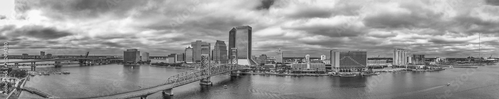 JACKSONVILLE, FL - APRIL 8, 2018: Panoramic aerial city view from the river. The city is a major attraction in Florida
