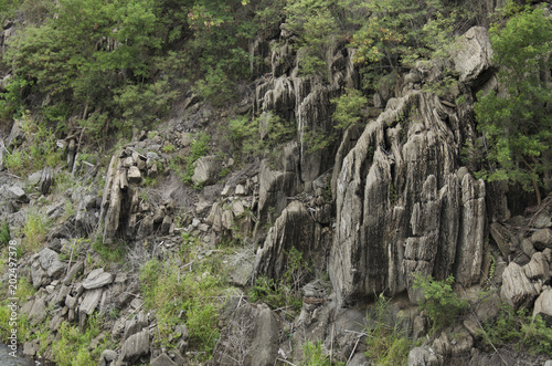 Stone cliffs in forest at Bhumibol Dam in Tak, Thailand