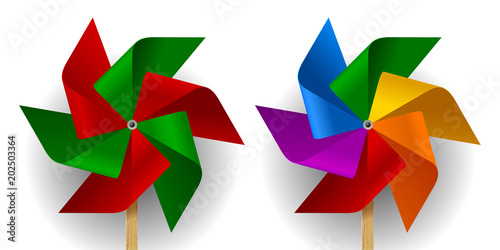 Two multi colored toy paper windmills with six blades