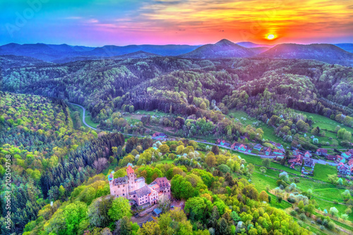 Sunset above Berwartstein Castle in the Palatinate Forest. Rhineland-Palatinate, Germany