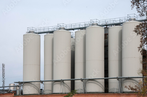Production. Industrial buildings in the blue sky
