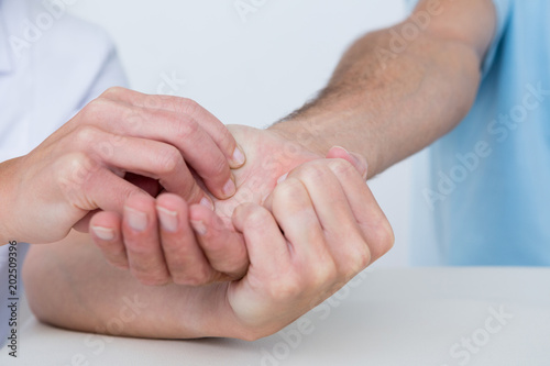 Doctor doing hand massage