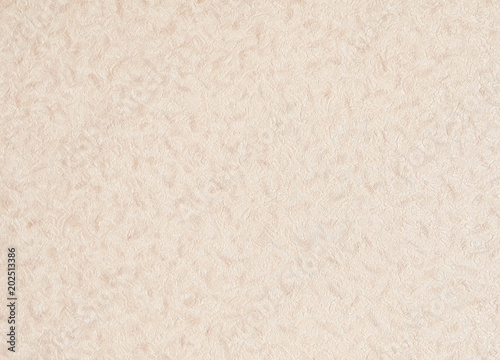 Beige wallpaper with patterns abstract.