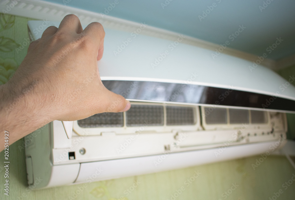 opening the lid of the air conditioner opening the lid of the air conditioner