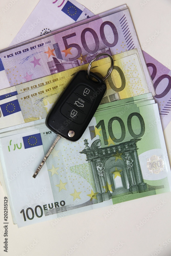 Car key on Euro money background.Concept photo of money, banking ,currency and foreign exchange rates.