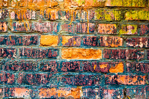Colorful Brick wall texture grunge urban street background © mettus