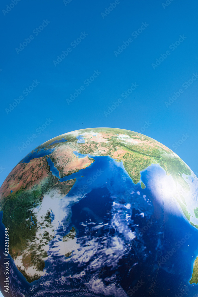 Earth globe planet ball over blue sky southern emisphere