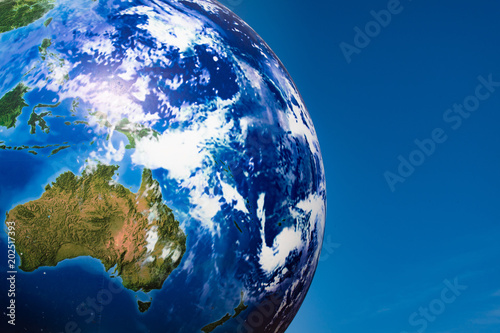 Earth globe planet ball over blue sky southern emisphere photo
