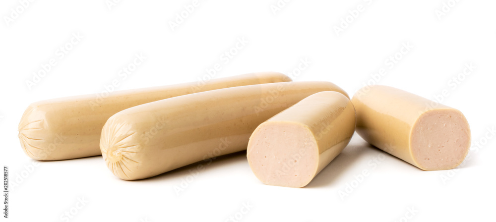 Two whole sausages and half on a white, close up. Two whole sausages and half on a white, close up.