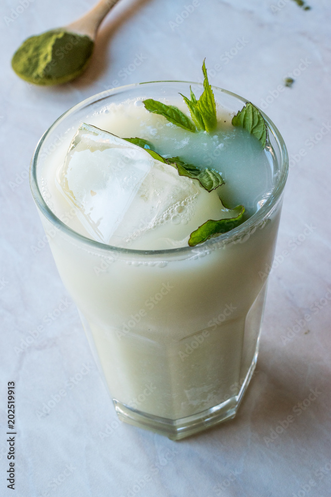 Iced Matcha Tea Latte with Mint Leaves / Smoothie. Iced Matcha Tea Latte with Mint Leaves / Smoothie.