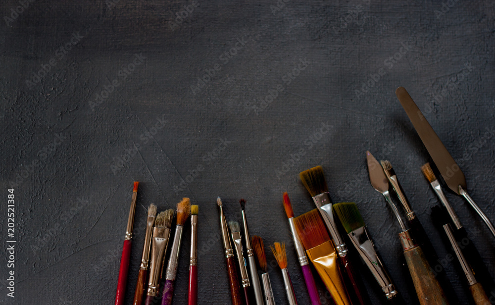 Artist paint brushes background. Artist paint brushes background.