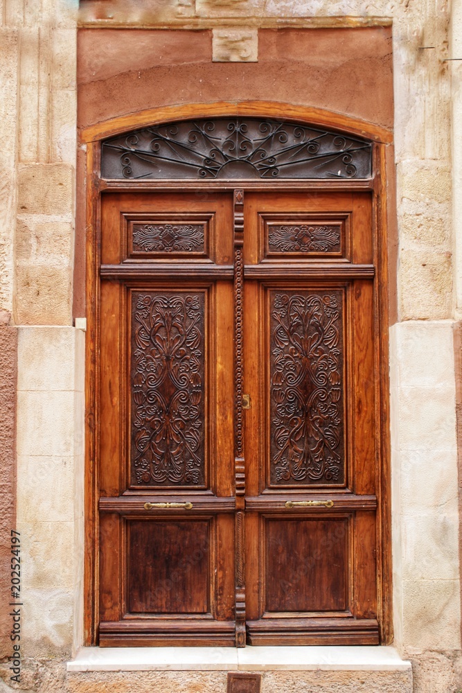 Old facade and entrance of majestic house in Alcaraz, Albacete province, Spain Old facade and entrance of majestic house in Alcaraz, Albacete province, Spain