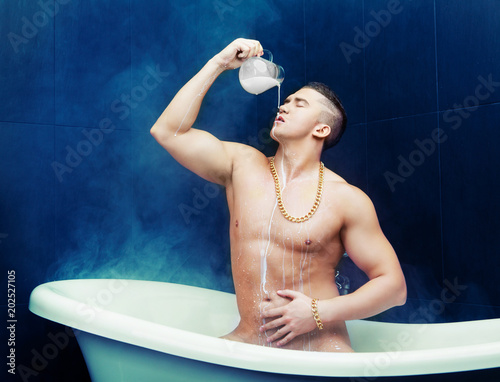  man taking a bath with milk