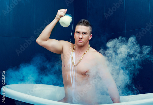  man taking a bath with milk
