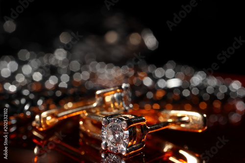 A ring of gold with a diamond closeup