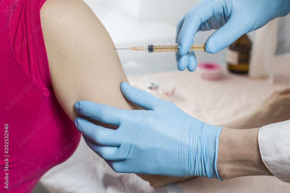 Inoculations, injection with a syringe. Vaccination. Inoculations, injection with a syringe. Vaccination.