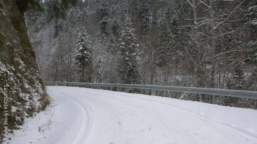 Snowy road with curves Snowy road with curves