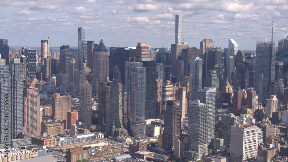 AERIAL: Glassy skyscrapers and condominium apartment buildings in busy New York