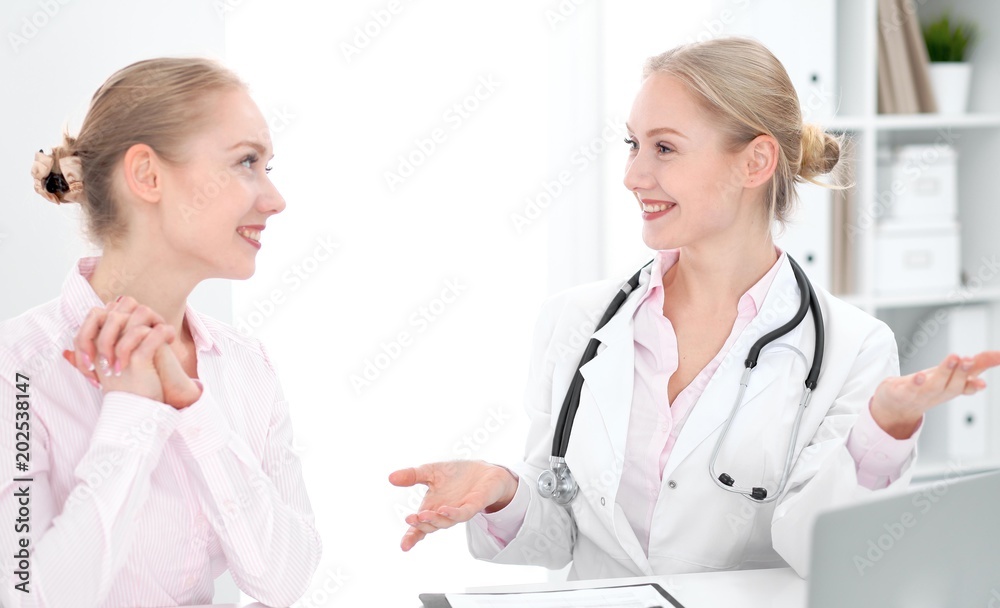 Doctor and patient during personal consulting in hospital Doctor and patient during personal consulting in hospital