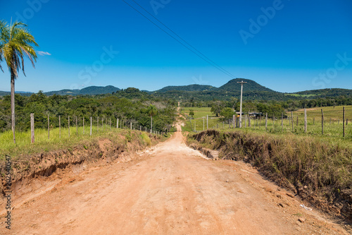 Typical red sand path in Paraguay: here, from the Colonia Independencia to the Ybytyruzu mountains. photo