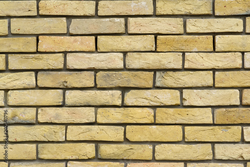 Decorative brickwork of building or house exterior facade wal, close up