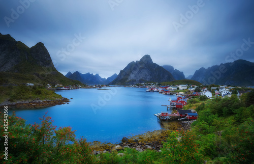 Mount Olstind and Reine fishing village on Lofoten islands photo