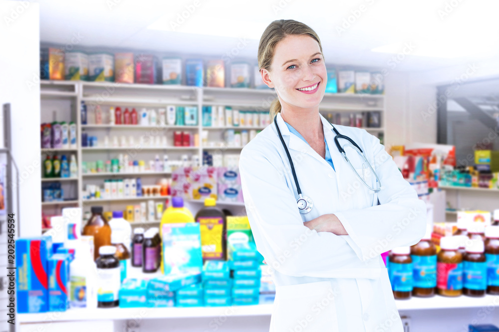 Smiling doctor looking at camera against close up of shelves of drugs Smiling doctor looking at camera against close up of shelves of drugs