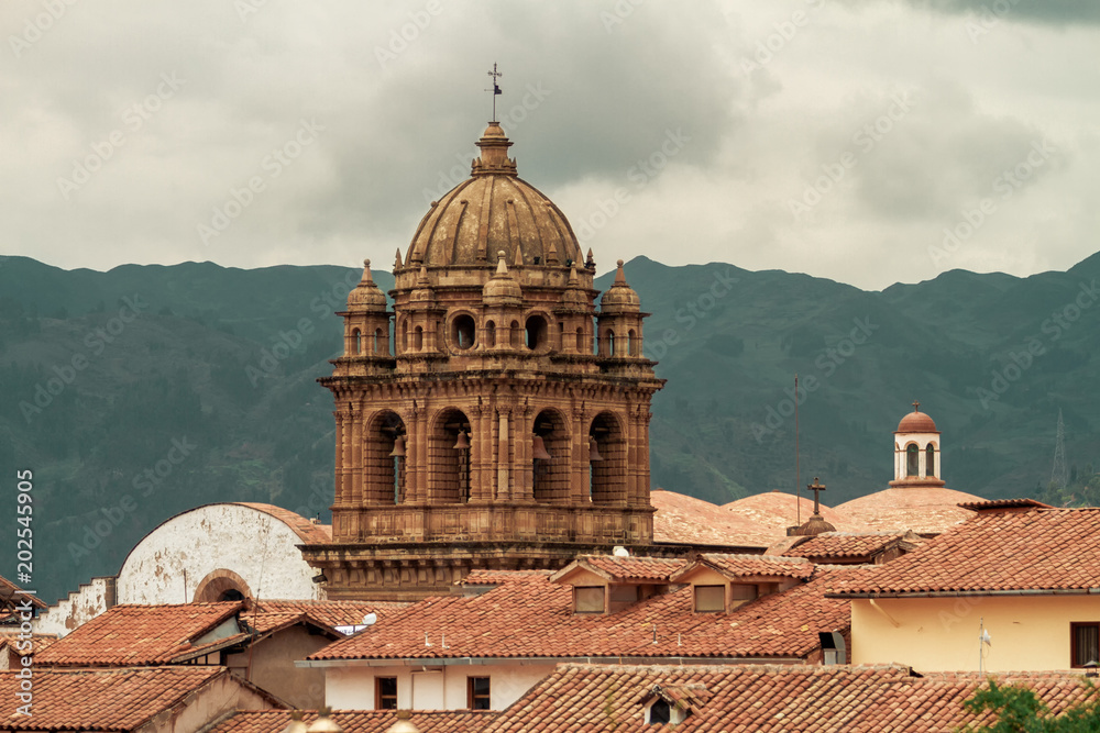 Belfry of the Minor Basilica de la Merced (Cusco, Peru) looms over rooftops