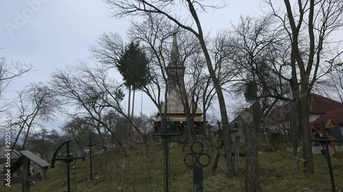 The Wooden Church's cemetery in Oncesti   photo