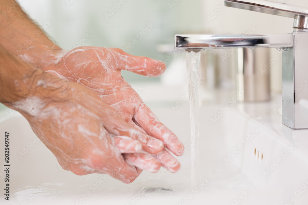 Εκτύπωση καμβά Washing hands with soap under running water