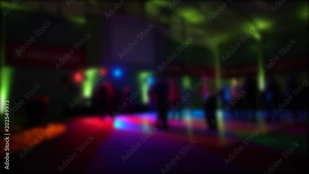 blurred dancing people at a corporate event blurred dancing people at a corporate event