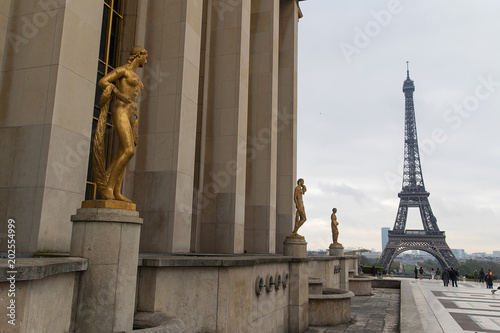 Gold statues overlooking the Eiffel Tower in Paris  France