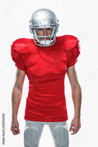 Portrait of American football player standing