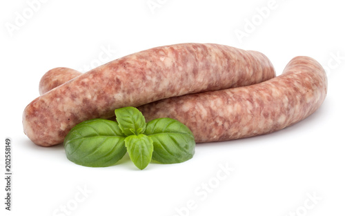 Raw sausage with basil leaf isolated on white background