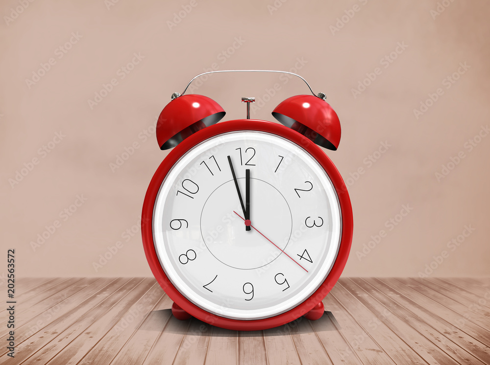 Alarm clock counting down to twelve against room with wooden floor Alarm clock counting down to twelve against room with wooden floor
