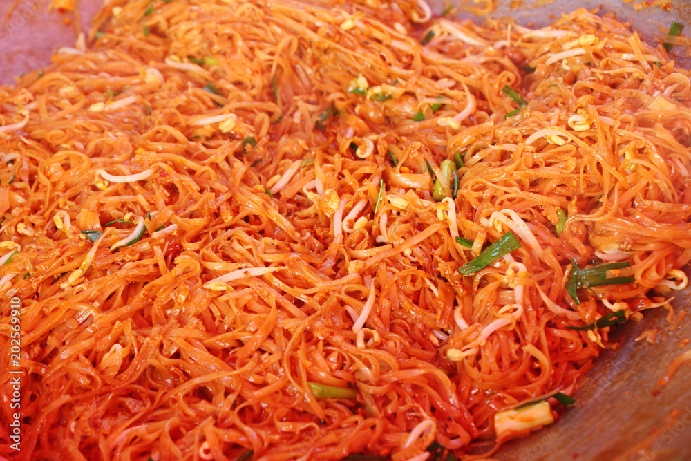 Fried noodle Thai style with pork in pan Fried noodle Thai style with pork in pan