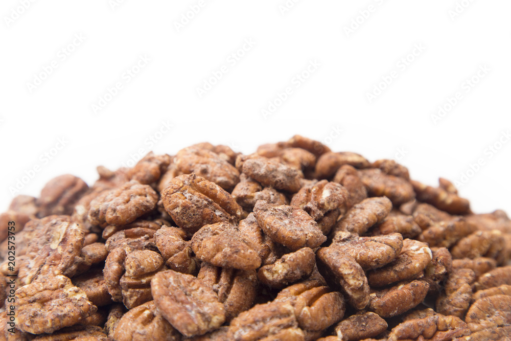 Candied Pecans on a White Background Candied Pecans on a White Background